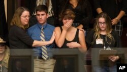 Sheryl Acquarola, a 16 year-old junior from Marjory Stoneman Douglas High School is overcome with emotion in the east gallery of the House of Representatives after the representatives voted not to hear the bill banning assault rifles and large capacity magazines at the Florida Capital in Tallahassee, Fla., Feb 20, 2018. (AP Photo/Mark Wallheiser)