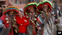 The government has cut power and water to Sur, in Diyarbakir, Turkey, as efforts are made to rebuild it. Residents who remain stand under street lamps at night to discuss their situation.