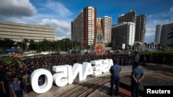 Anti-riot police officers gather near the Cultural Center of the Philippines ahead of the Association of South East Asian Nations (ASEAN) Summit and related meetings in Manila, Nov. 11, 2017. 