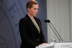 FILE - Denmark's Prime Minister Mette Frederiksen addresses a press conference on the novel coronavirus COVID-19 at the State Department in Copenhagen, Denmark, April 6, 2020.