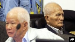 FILE - Former Khmer Rouge leaders Noun Chea and Khieu Samphan in court.