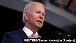 USA, Washington, U.S. President Joe Biden leaves the stage after giving remarks on the administration's coronavirus disease 