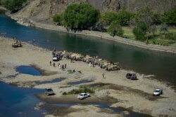 FILE - Humvee vehicles from the Afghan Security Forces are pictured in Panjshir province in Afghanistan on Aug. 16, 2021.