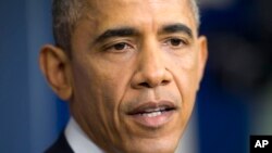 President Barack Obama speaks during a news conference at the White House in Washington, Dec. 19, 2014.