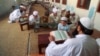 An undated photo of Pakistani children studying the Quran at a religious school in Lahore, Pakistan. Pakistan's religious schools, or madrassas, face renewed scrutiny with many alleging that the schools serve as breeding grounds for violent extremists.