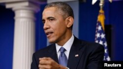 President Barack Obama answers a question about the cyberattack on Sony Pictures after his end of the year press conference in the briefing room of the White House, Dec. 19, 2014. 