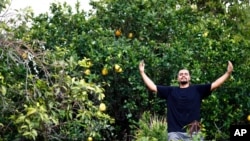 Jesus Lopez, who was deported from the U.S. in 2020, is pictured at his family's carpentry workshop in Zapopan, Jalisco state, Mexico, May 13, 2021. He's from Guadalajara, Mexico, but his life was in Chicago. 