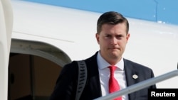 FILE - White House Staff Secretary Rob Porter arrives aboard Air Force One in Morristown, New Jersey, Aug. 4, 2017. 