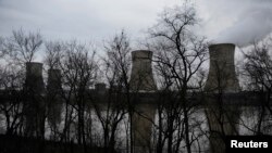 FILE - The Three Mile Island nuclear power plant, where the U.S. suffered its most serious nuclear accident in 1979, is seen across the Susquehanna River in Middletown, Pennsylvania. 