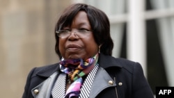 FILE - The Central African Republic’s defense minister, Marie-Noëlle Koyara, is pictured at the French Ministry of Defense in Paris before a meeting with the French defense minister, Nov. 10, 2017. 