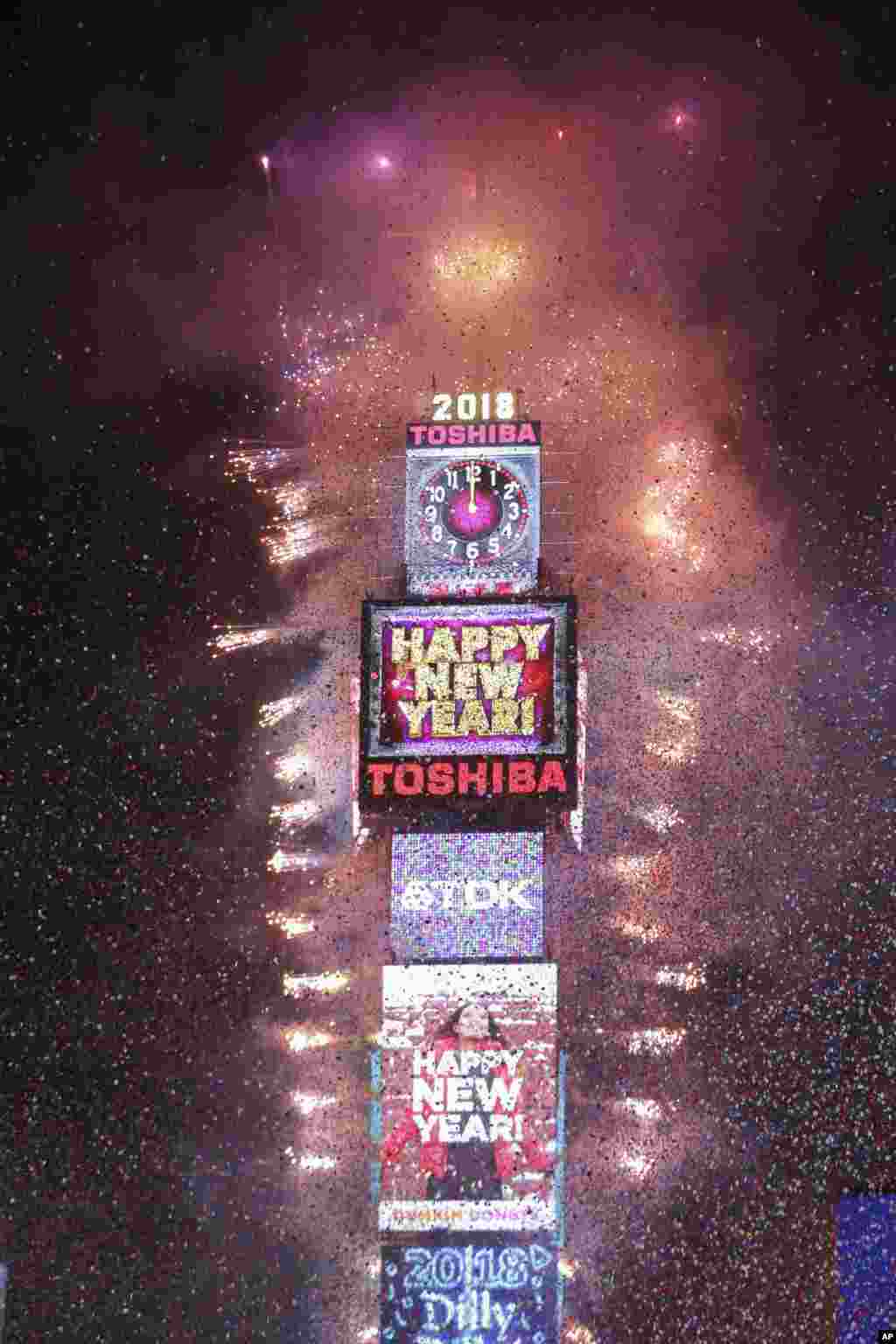 The ball drops during the New Year's Eve celebration in Times Square, Dec. 31, 2017, in New York. 