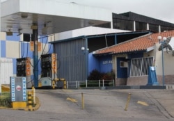 A shuttered gas station in La Grita is seen due to fuel shortages, June 19, 2019.