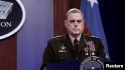 FILE - Joint Chiefs of Staff Chairman Army General Mark Milley holds a news briefing at Pentagon in Arlington, Virginia, August 18, 2021. Milley met with General Valery Gerasimov, chief of the Russian General Staff, in Helsinki Wednesday.