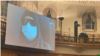 An Iranian woman disguised to conceal her identify gives live video testimony from Iran on Nov. 10, 2021, to a London-based international people's tribunal investigating alleged atrocities in Iran's deadly crackdown on nationwide protests in Nov. 2019. (VOA Persian/Ramin Haghjoo)