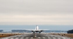 A Delta Air Lines plane is taking off at Reagan Washington National Airport outside Washington, D.C. (Photo by Diaa Bekheet)