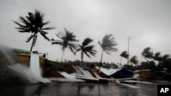 Street shops are seen collapsed because of gusty winds preceding the landfall of Cyclone Fani on the outskirts of Puri, in the Indian state of Odisha, May 3, 2019. 