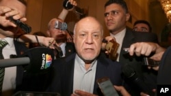 FILE - Iran's oil minister, Bijan Zangeneh, speaks to journalists at a hotel in Vienna, Austria, June 19, 2018.