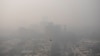 Kabut asap menutupi gedung-gedung pencakar langit di New Delhi, India, Kamis, 4 November 2020.
