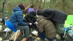 As Migrants Return to French Port of Calais, Macron Demands Britain Pay Up