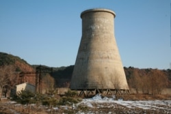 FILE - This photo, taken Dec. 18, 2007, and released June 27, 2008, by the official Chinese news agency Xinhua, shows the cooling tower at the Yongbyon nuclear complex near Pyongyang, North Korea.