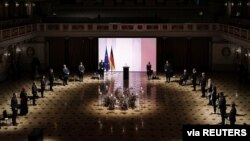 German President Frank-Walter Steinmeier, German Chancellor Angela Merkel and other state leaders attend a memorial ceremony for the victims of COVID-19 pandemic, in Berlin, Apr. 18, 2021. (Jesco Denzel/Bundesregierung/Handout via Reuters)