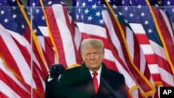 FILE - Then-President Donald Trump arrives to speak at a rally in Washington, Jan. 6, 2021. Facebook announced June 4, 2021, that Trump's Facebook ban would last at least two years. 