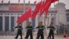 Chinese soldiers march to their post outside the Great Hall of the People in Beijing, March 7, 2025. 