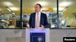 FILE - Britain's Health Secretary Matt Hancock delivers a speech on the COVID-19 vaccine program at the Jenner institute in Oxford, Britain, June 2, 2021. (Jacob King/Pool via Reuters)