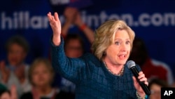 FILE - Democratic presidential candidate Hillary Clinton speaks during a campaign stop in Council Bluffs, Iowa, Jan. 5, 2016. 