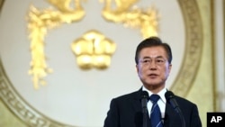 South Korean President Moon Jae-in speaks during a press conference marking his first 100 days in office at the presidential house in Seoul, Aug. 17, 2017. 