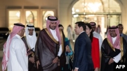 U.S. Secretary of State Marco Rubio greets well-wishers upon arrival at King Abdulaziz International Airport in Jeddah, on March 10, 2025.