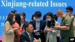 新疆维吾尔自治区政府新闻发言人徐贵相在北京举行的有关新疆问题的记者会上 （2021年5月25日）