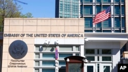 FILE - The U.S. Embassy and the national flag are seen in Moscow, Russia.