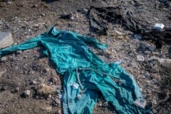 Garments traditional in Afghanistan and Pakistan are found in an area where refugees hide out in when they first enter Turkey, Aug. 11, 2021, in Van, Turkey. (Claire Thomas/VOA)