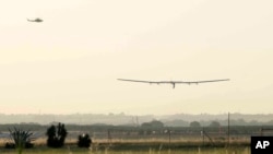 The Solar Impulse 2 plane lands at the San Pablo airport in Seville, Spain on Thursday, June 23, 2016. An experimental solar-powered airplane Thursday completed an unprecedented three-day flight across the Atlantic in the latest leg of its globe-circling voyage. (AP Photo/Laura Leon)