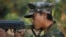 FILE - A Kachin soldier mans a frontline position, facing off against the Myanmar government.