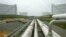 FILE - Pipelines running from the offshore docking station to four liquefied natural gas (LNG) tanks at the Dominion Resources Inc. Liquefied Natural Gas facility in Cove Point, Maryland, are seen in a June 13, 2003, photo.
