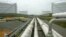 FILE - Pipelines running from the offshore docking station to four liquefied natural gas (LNG) tanks at the Dominion Resources Inc. Liquefied Natural Gas facility in Cove Point, Maryland, June 13, 2003.