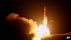 A SpaceX Falcon 9 rocket is launched from the Space Launch Complex-4 at Vandenberg Air Force Base, California, Oct. 9, 2017. On Oct. 11, SpaceX launched a rocket from Florida's Kennedy Space Center.