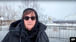 Russian opposition leader Alexey Navalny's mother, Lyudmila Navalnaya, speaks near the prison colony in the town of Kharp, Russia, in this grab taken from video provided by the Navalny Team on Feb. 20, 2024.
