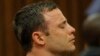 Olympic and Paralympic track star Oscar Pistorius reacts as he listens to Judge Thokozile Masipa's judgement at the North Gauteng High Court in Pretoria, September 11, 2014. A South African judge cleared Oscar Pistorius of all murder charges on Thursday, 