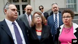 ACLU attorney Lee Gelernt, left, and colleagues speak outside the U.S. Courthouse in Cincinnati, April 25, 2018. An appeals panel was to hear arguments over a Trump administration bid to deport Iraqi nationals; on Dec. 20, 2018, the panel ruled in favor of the administration.