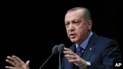 Le président turc Recep Tayyip Erdogan donne un discours à Ankara, le 19 mars 2018. 