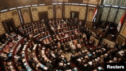 Costumed cast members of Broadway's "The Lion King," L. Steven Taylor, as Mufasa, right, and and Tshidi Manye, as Rafiki, left, appear in Times Square to herald the return of Broadway theater in New York.
