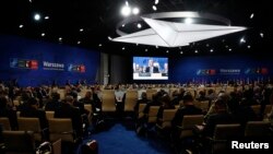 Participants attend the NATO Summit in Warsaw, Poland, July 8, 2016.