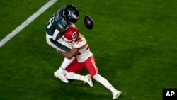 Kansas City Chiefs cornerback L'Jarius Sneed (38) breaks up a pass intended for Philadelphia Eagles running back Miles Sanders (26) during the second half of the NFL Super Bowl 57 football game, Feb. 12, 2023, in Glendale, Arizona. 