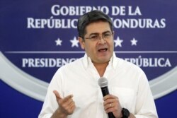 FILE - Honduran President Juan Orlando Hernandez holds a news conference at the Presidential House in Tegucigalpa, Honduras, Oct. 3, 2019.