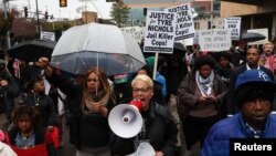 People protest after the release of the body cam footage showing police officers beating Tyre Nichols in downtown Memphis, Tennessee, Jan. 28, 2023.