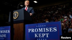 U.S. President Donald Trump holds a rally with supporters at North Side Middle School in Elkhart, Ind., May 10, 2018.