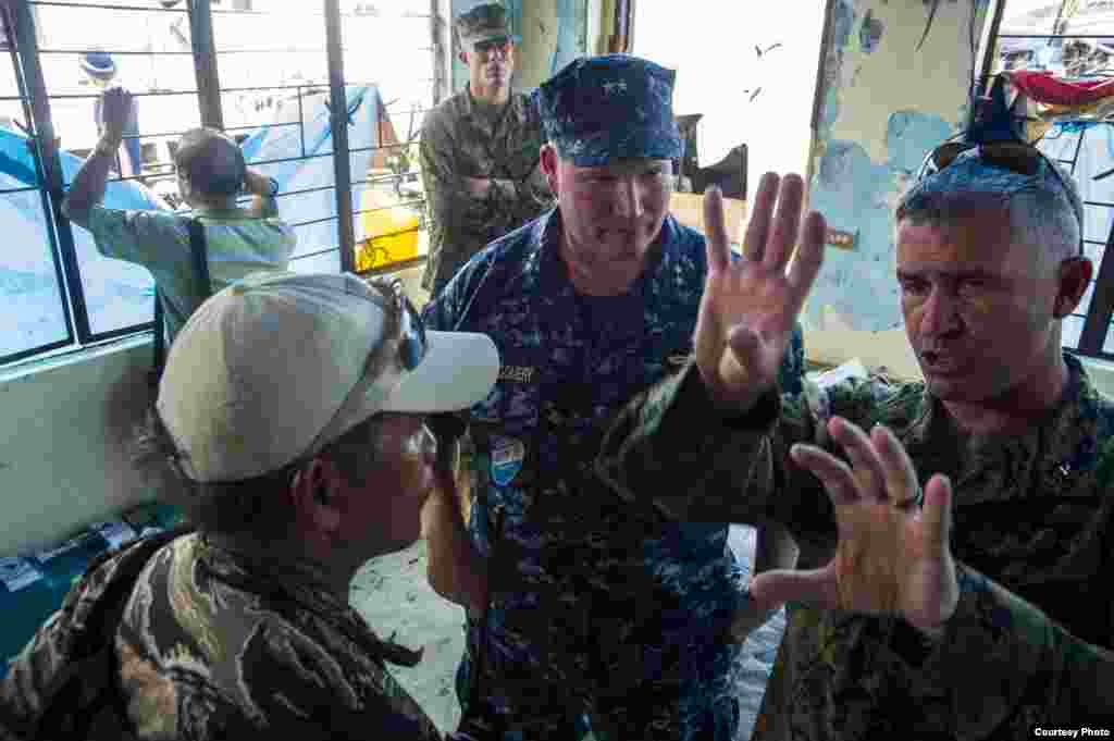 From right to left: U.S. Marine Corps Brig. Gen. Paul Kennedy, commanding general, 3d Marine Expeditionary Brigade; U.S. Navy Rear Adm. Mark Montgomery, commander, Battle Force 7th Fleet; and Philippine navy Capt. Roy Vincent Trinidad, officer in charge, 